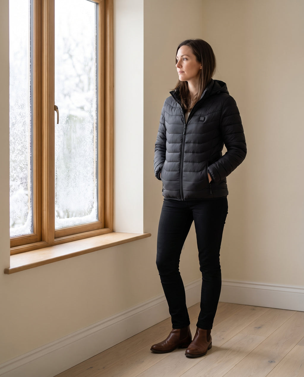 Black | Heated Jacket worn by the window