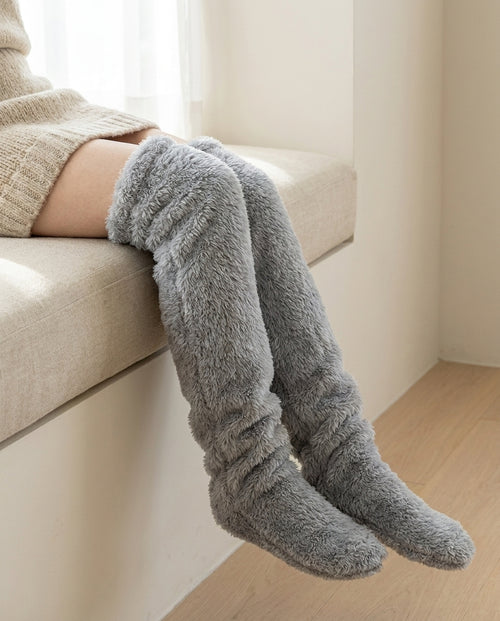 Silver grey | Over-the-Knee Fuzzy Socks worn on a window seat