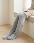 Silver grey | Over-the-Knee Fuzzy Socks worn on a window seat